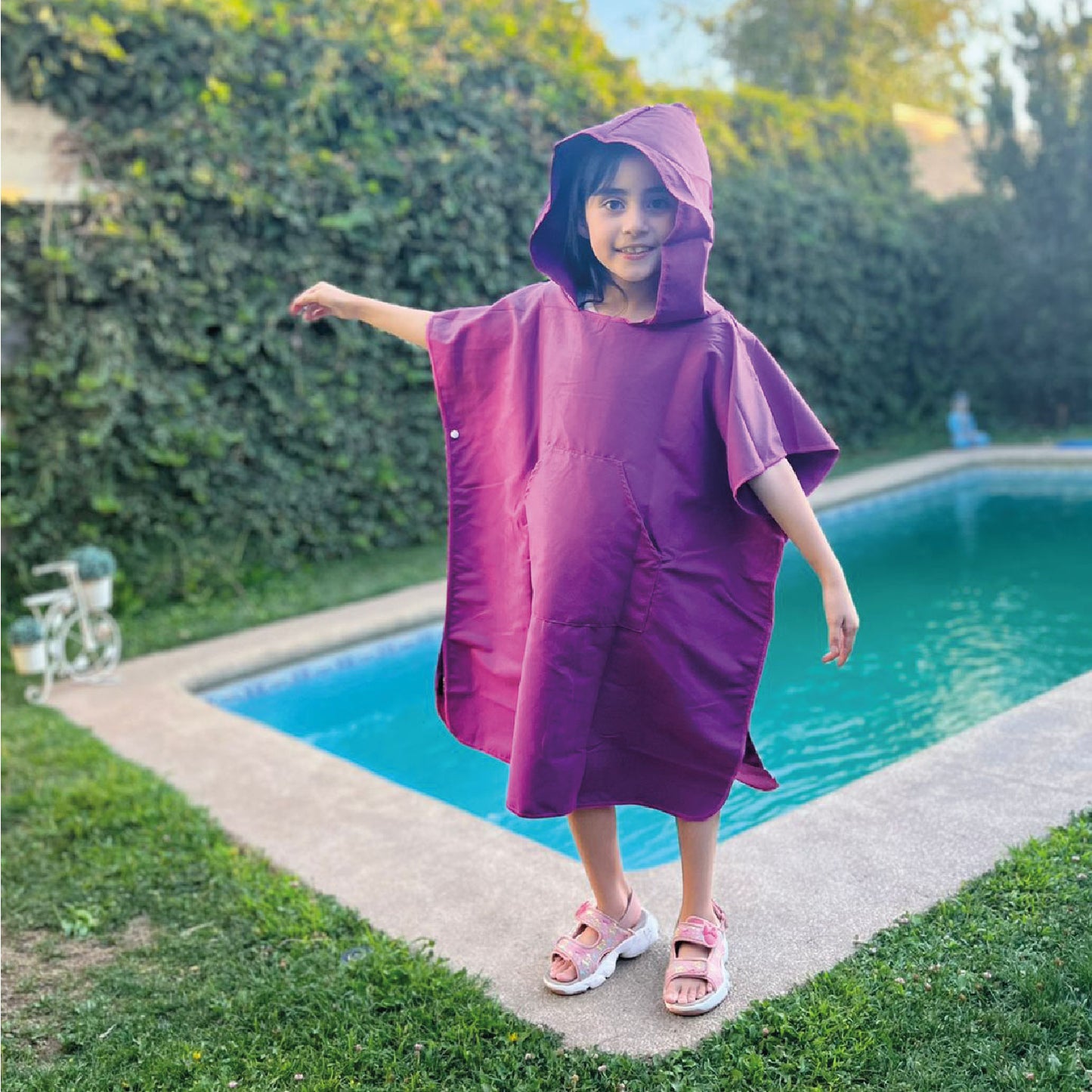 PONCHO NIÑO FUCSIA